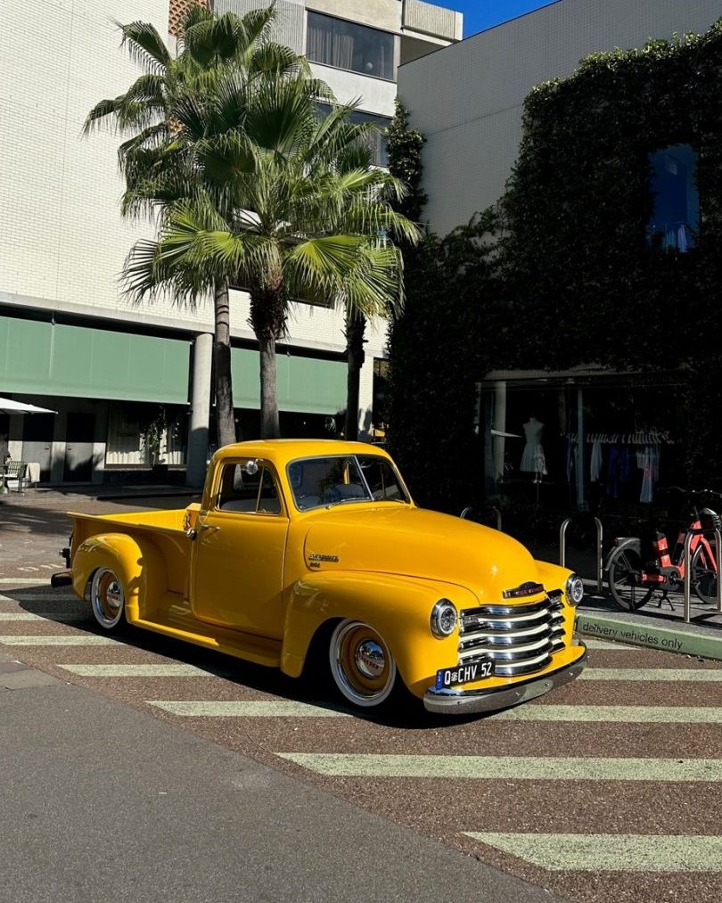 52 Chevy 3100 pick-up truck parked facing right and slighty to the side