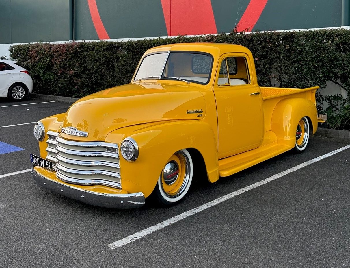 52 Chevy 3100 pick-up truck parked facing slightly forward